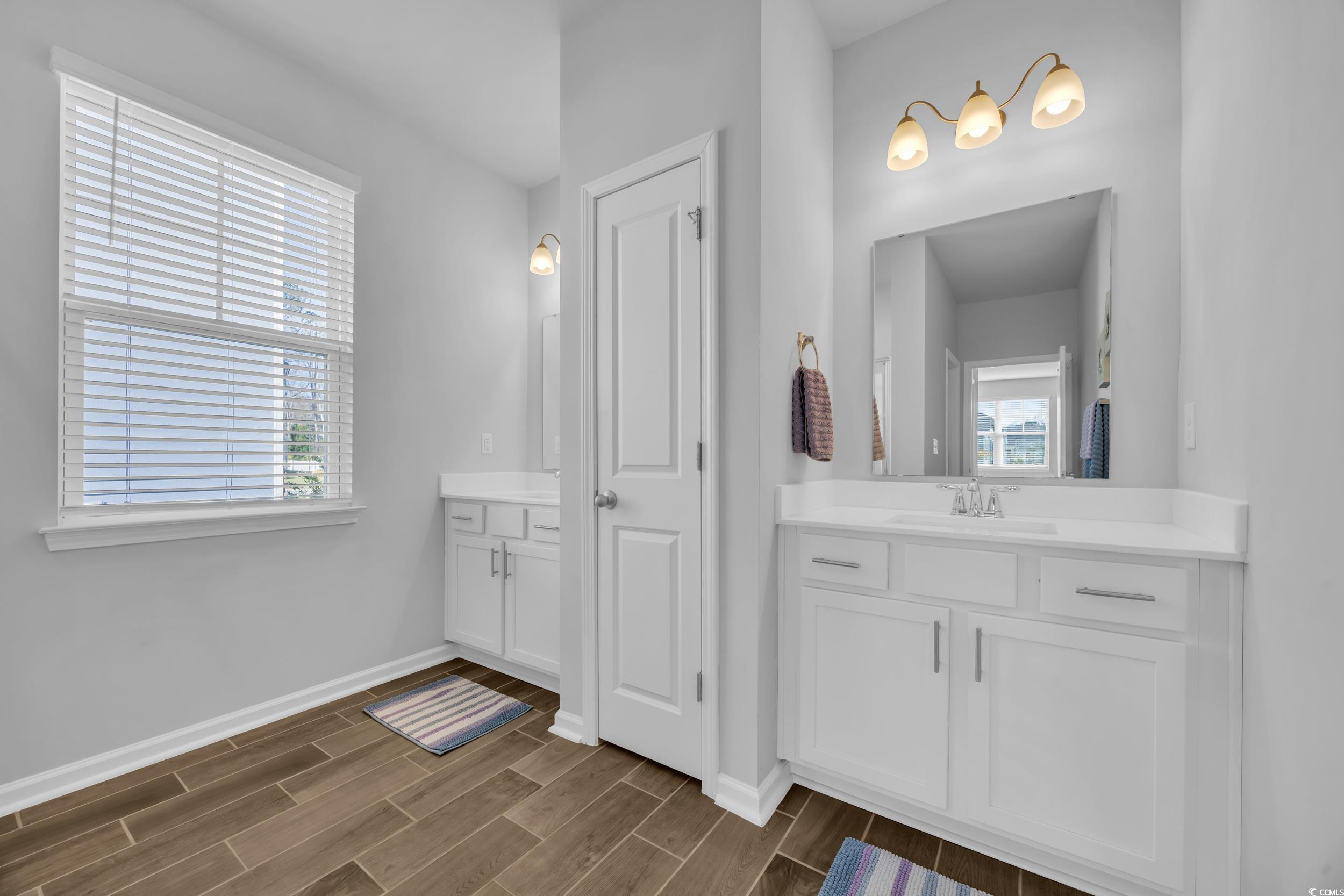 223 Juniata Loop Little River, SC 29566 - Photo 28 of 39 Full bathroom featuring wood finish floors, vanity