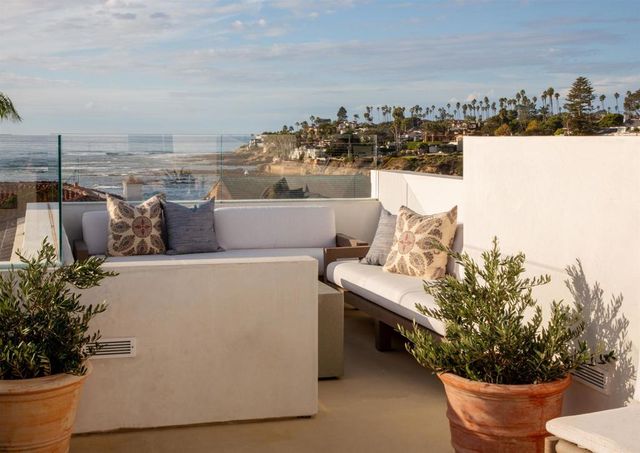 a view of a terrace with furniture