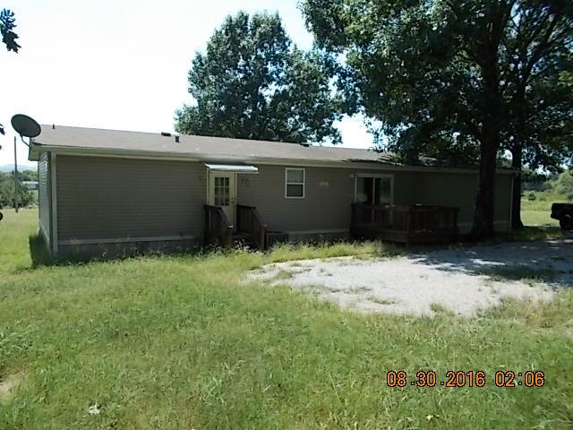 1973 South Commerce Road Watertown, TN 37184 - Photo 19 of 22 a backyard of a house with lots of green space