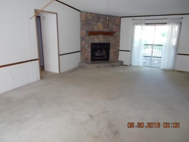 1973 South Commerce Road Watertown, TN 37184 - Photo 5 of 22 a view of empty room with a fireplace