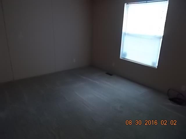 1973 South Commerce Road Watertown, TN 37184 - Photo 9 of 22 a view of an empty room with a window