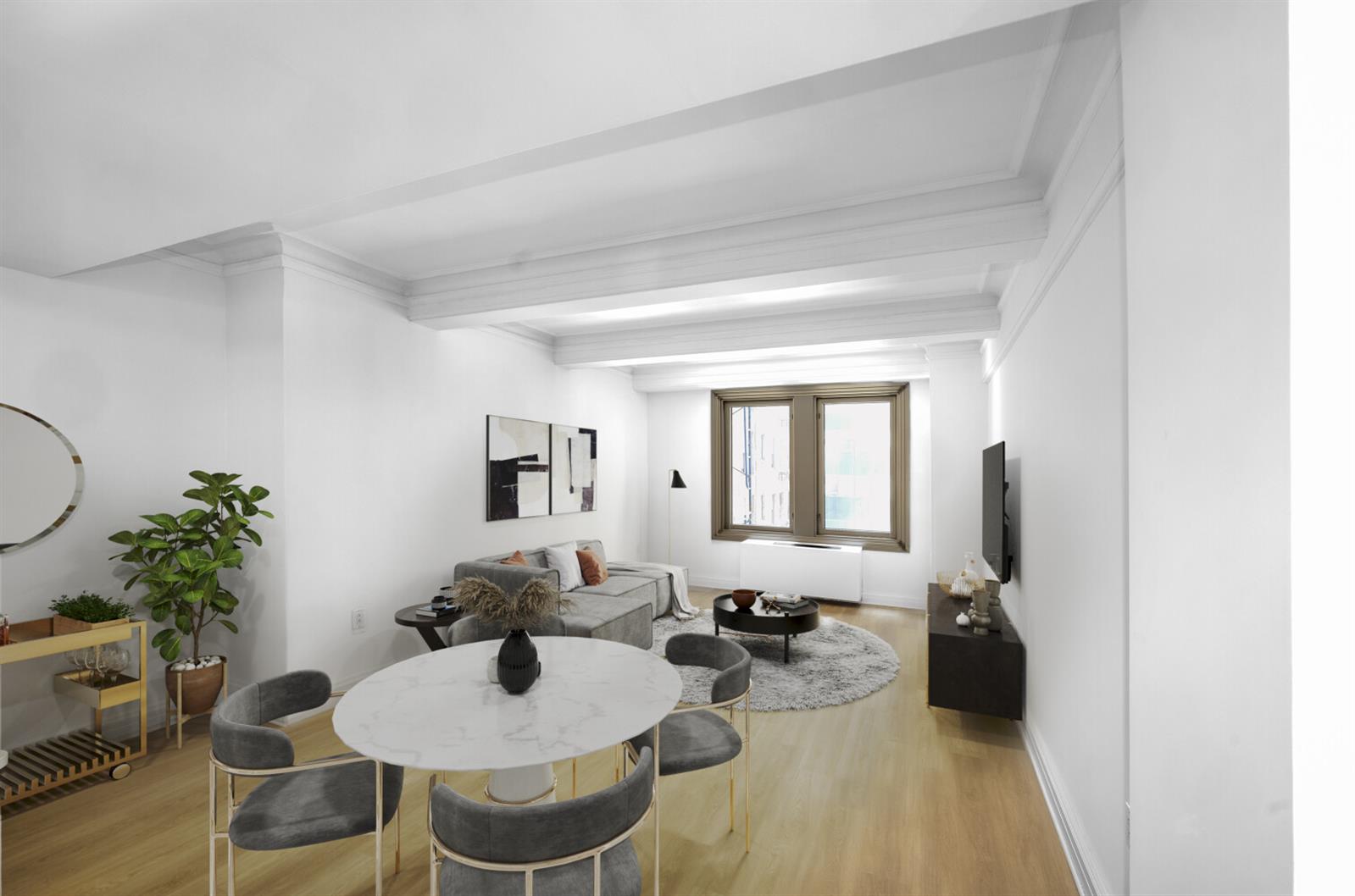 101 West 55th Street, Unit 701 Manhattan, NY 10019 - Photo 1 of 11 a living room with furniture and a potted plant