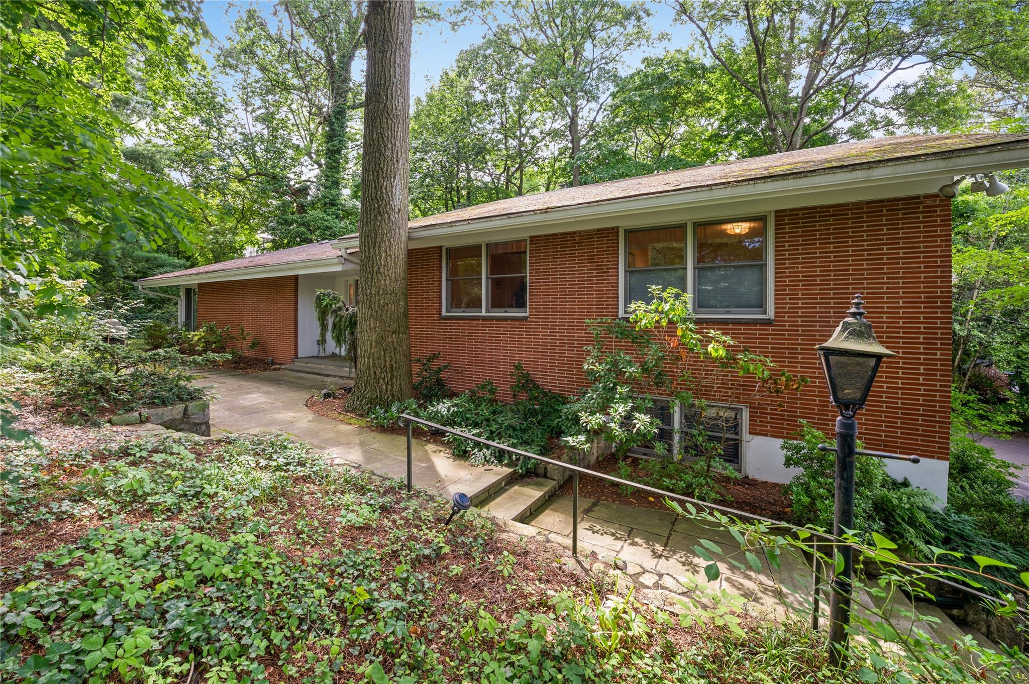 a house with trees in front of it