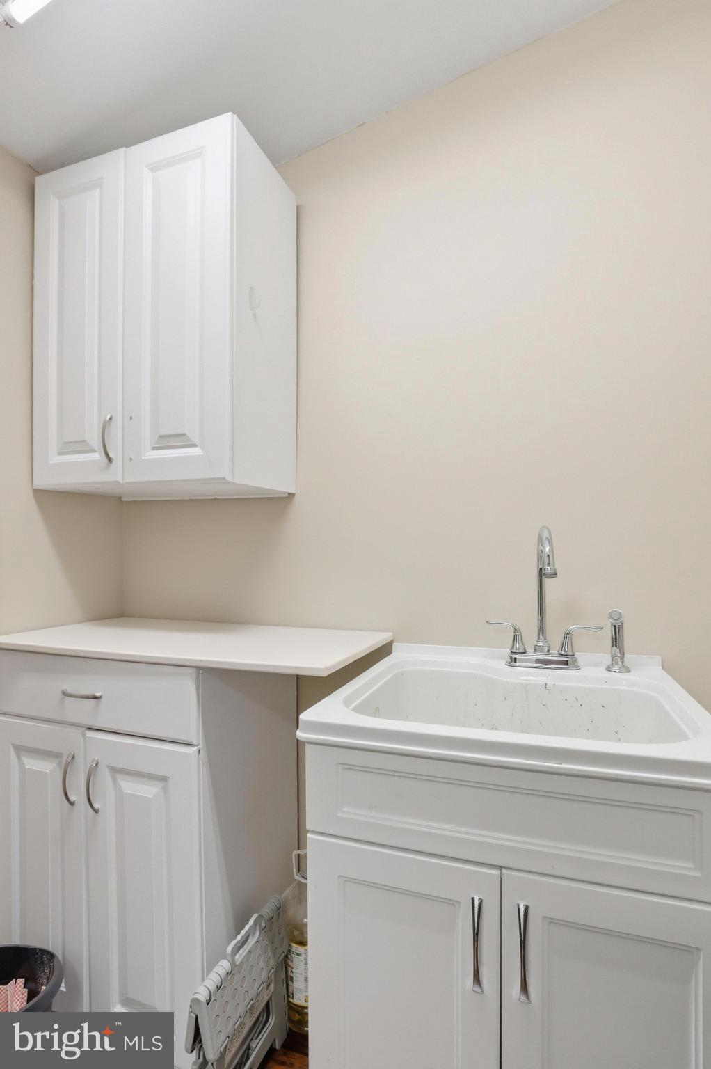 24815 Zoar Road Georgetown, DE 19947 - Photo 24 of 49 a utility room with a sink