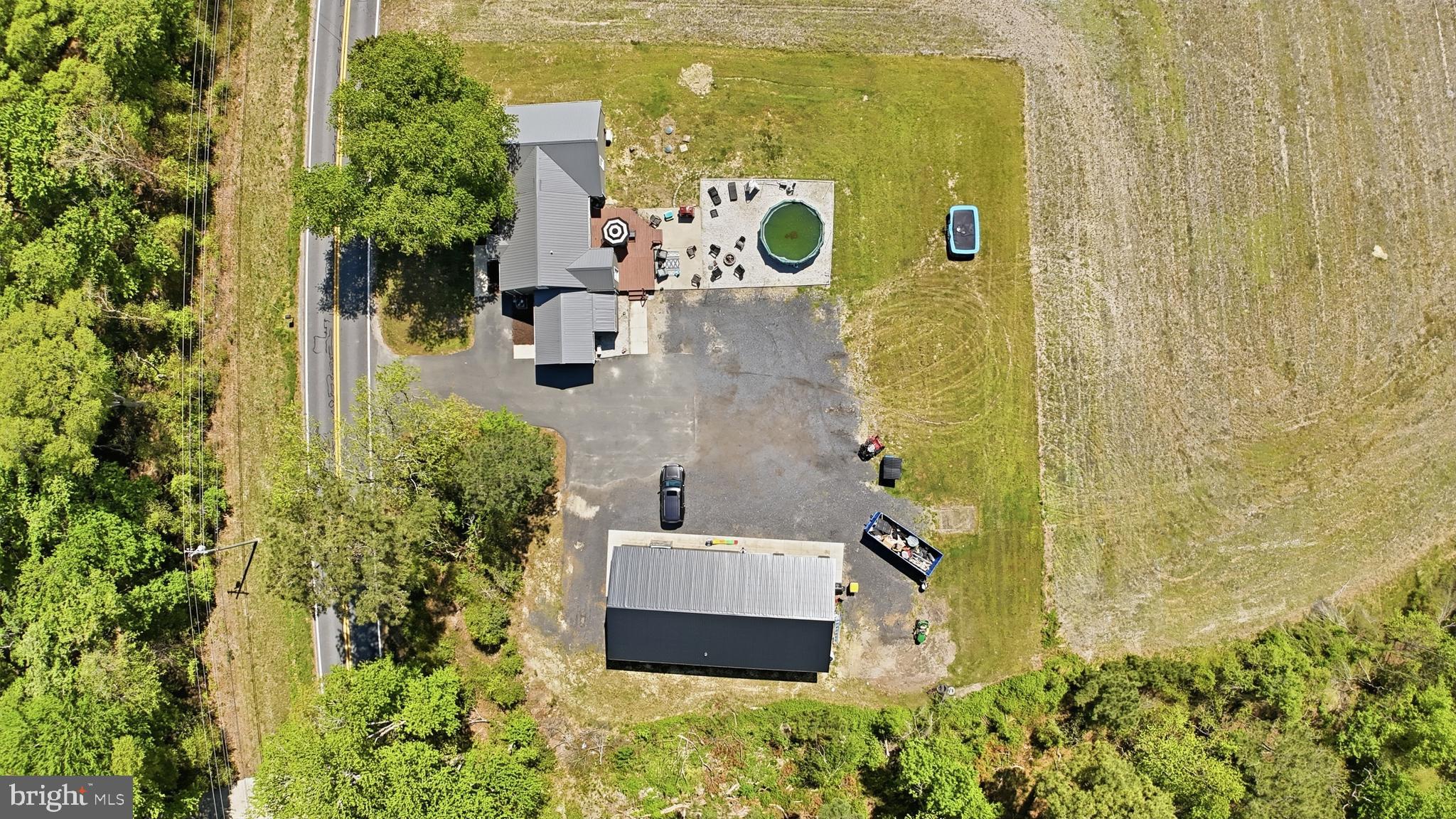 24815 Zoar Road Georgetown, DE 19947 - Photo 41 of 49 aerial view of a house with a garden