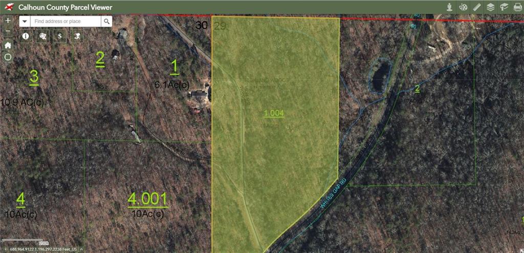 42889 Whites Gap Road Southwest Jacksonville, AL 36265 - Photo 2 of 2 a green field with lots of trees