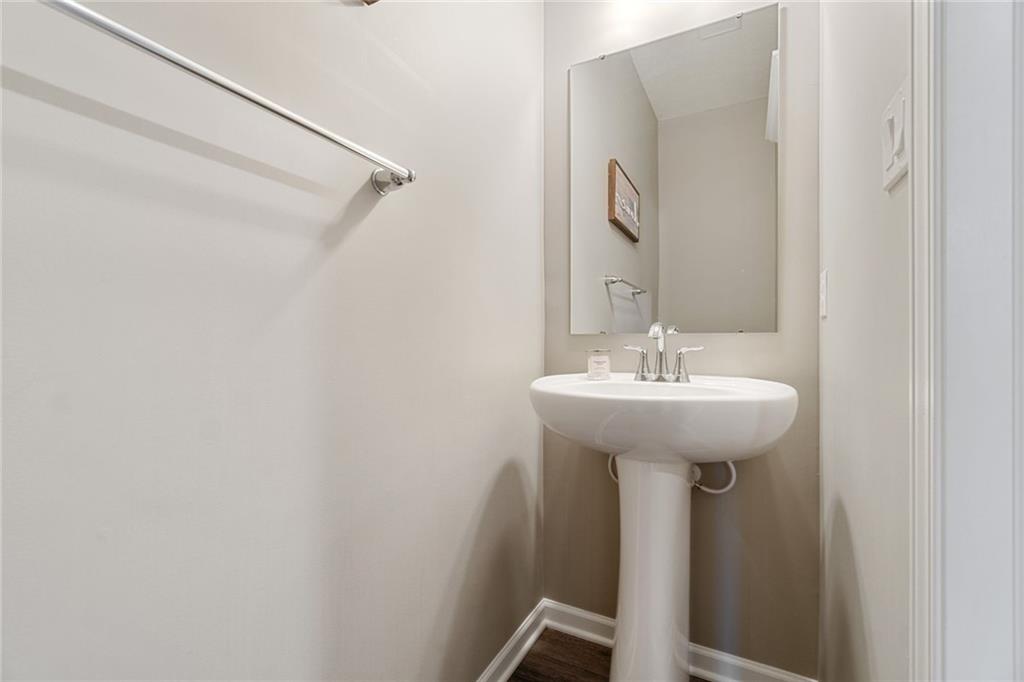 380 Trinity Way Wexford, PA 15090 - Photo 14 of 29 a bathroom with a sink and mirror