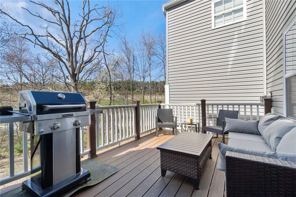 380 Trinity Way Wexford, PA 15090 - Photo 15 of 29 a balcony with furniture and wooden floor