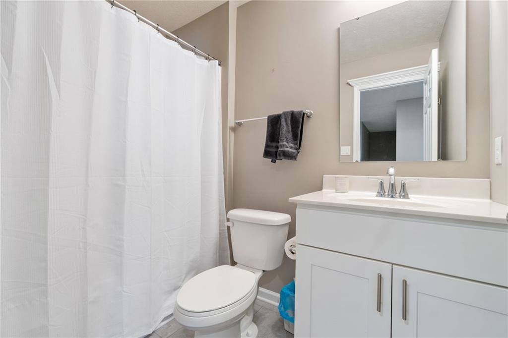 380 Trinity Way Wexford, PA 15090 - Photo 22 of 29 a bathroom with a toilet a sink and mirror