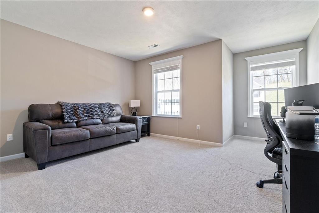 380 Trinity Way Wexford, PA 15090 - Photo 23 of 29 a living room with furniture and a window