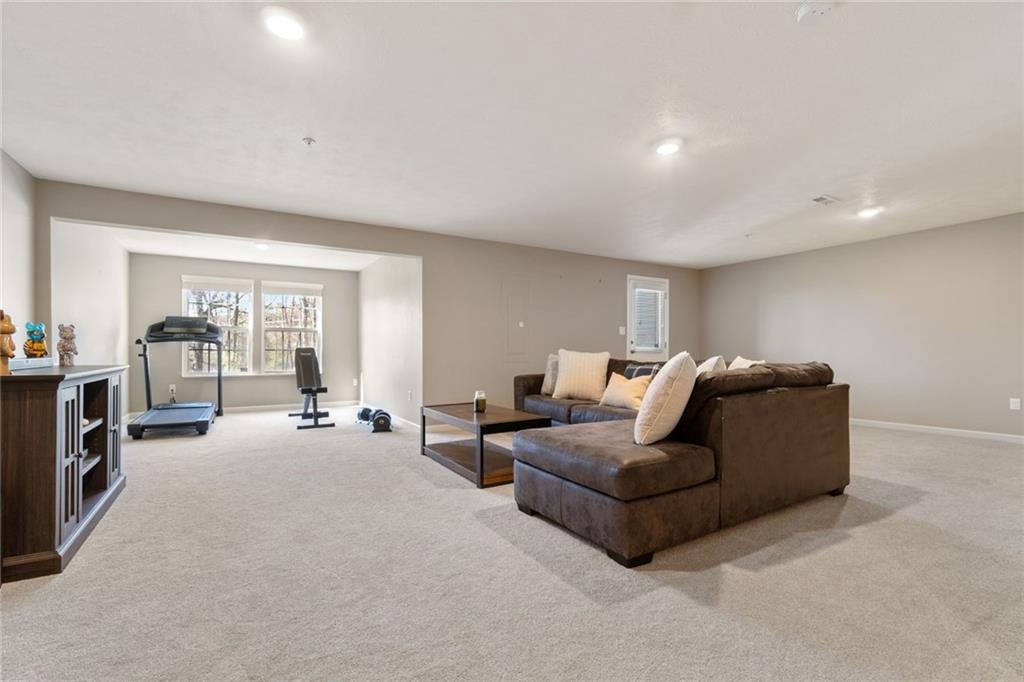 380 Trinity Way Wexford, PA 15090 - Photo 25 of 29 a living room with furniture and a flat screen tv