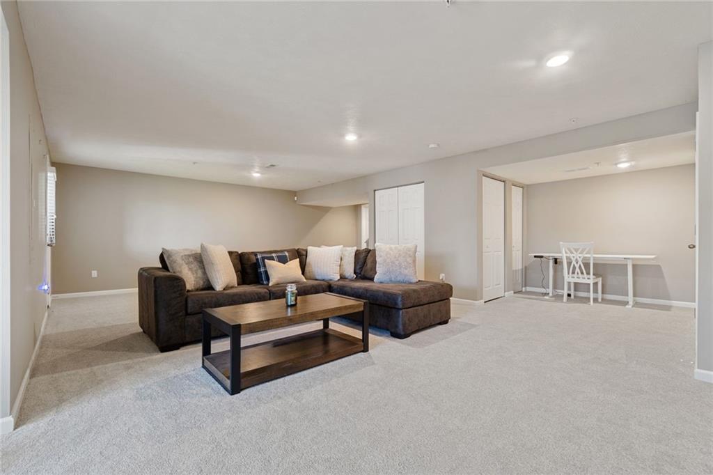 380 Trinity Way Wexford, PA 15090 - Photo 26 of 29 a living room with furniture and a table