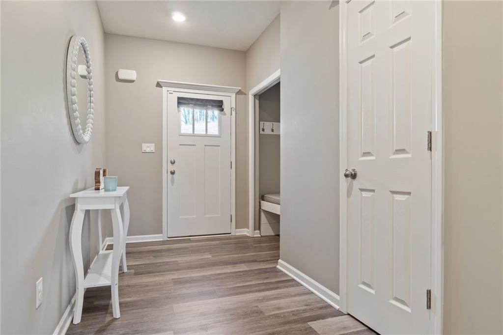 380 Trinity Way Wexford, PA 15090 - Photo 4 of 29 a view of a room with wooden floor and front door