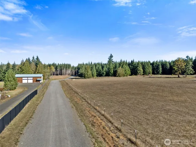 a view of swimming pool with a yard