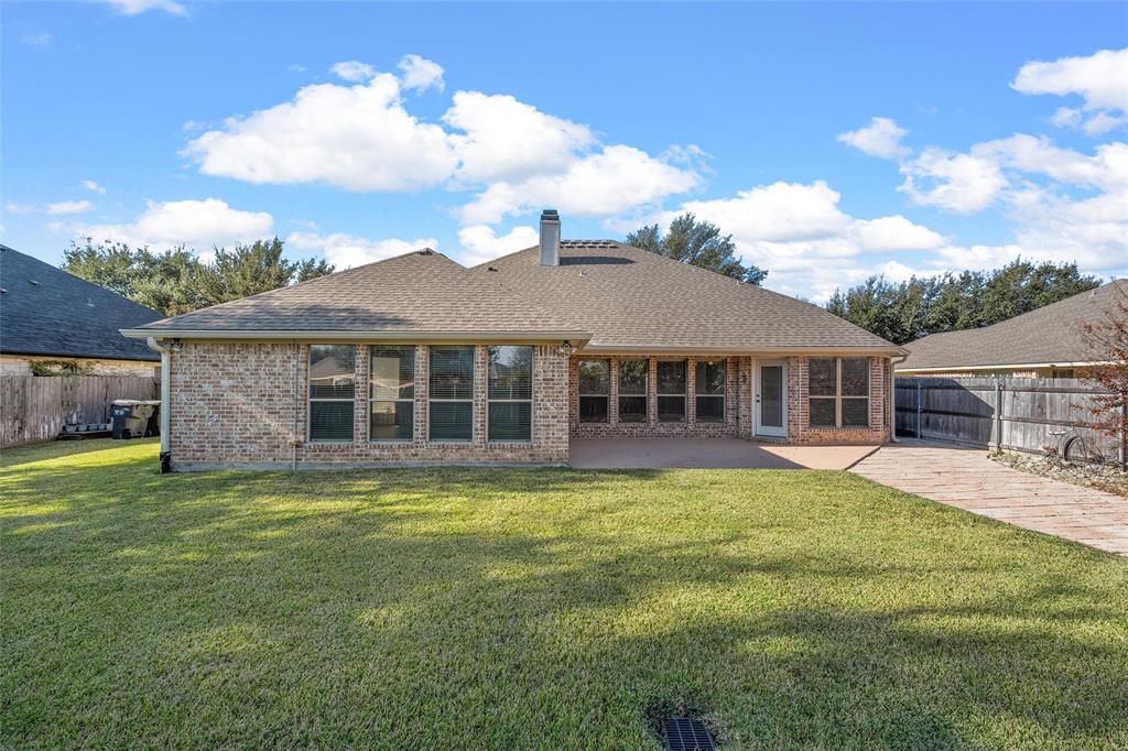 302 Canterbury Road Waco, TX 76712 - Photo 24 of 29 a view of a house with a yard