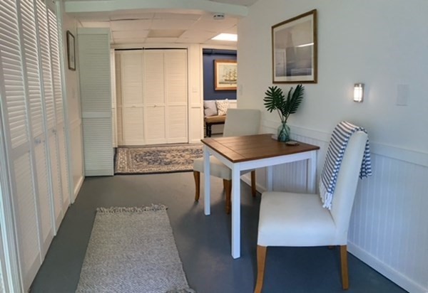 54 Grapevine Road Gloucester, MA 01930 - Photo 15 of 18 a dining room with furniture and window
