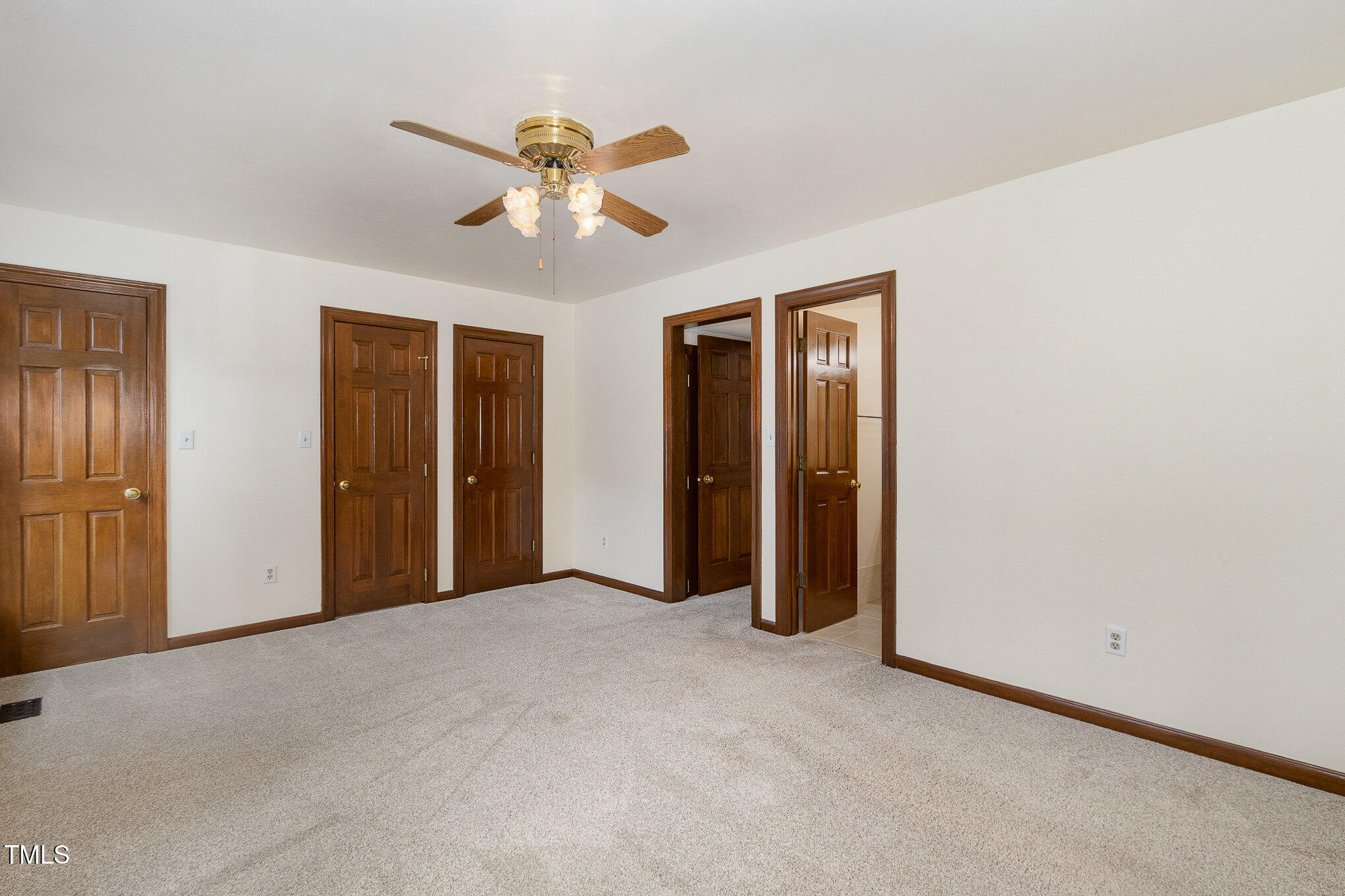 7212 Rabbit Run Wake Forest, NC 27587 - Photo 18 of 32 a view of an empty room with chandelier fan