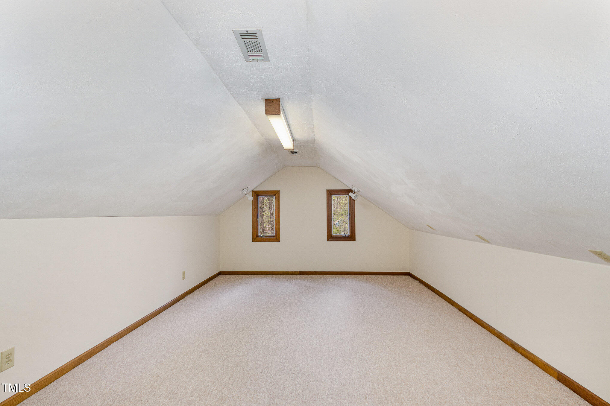 7212 Rabbit Run Wake Forest, NC 27587 - Photo 24 of 32 a view of an empty room with a window