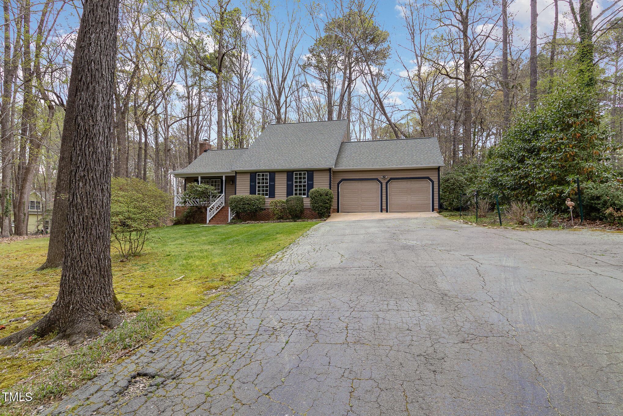 7212 Rabbit Run Wake Forest, NC 27587 - Photo 2 of 32 a house view with a garden space
