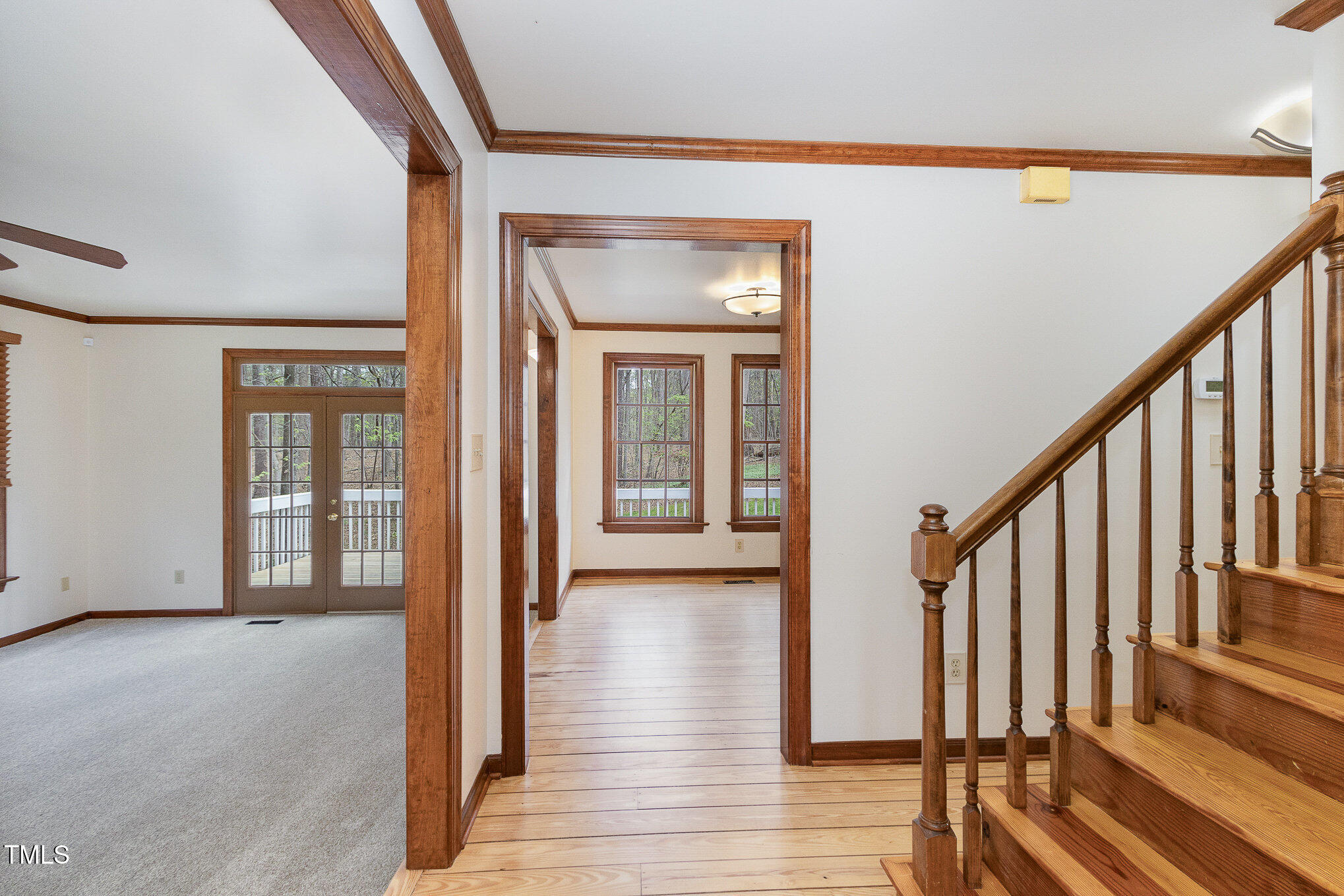 7212 Rabbit Run Wake Forest, NC 27587 - Photo 4 of 32 a view of an entryway with wooden floor