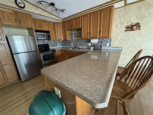 a view of a living room and dining room