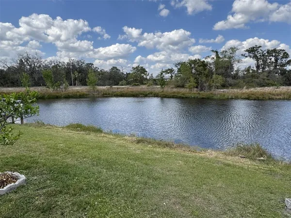 a view of a lake with outdoor space