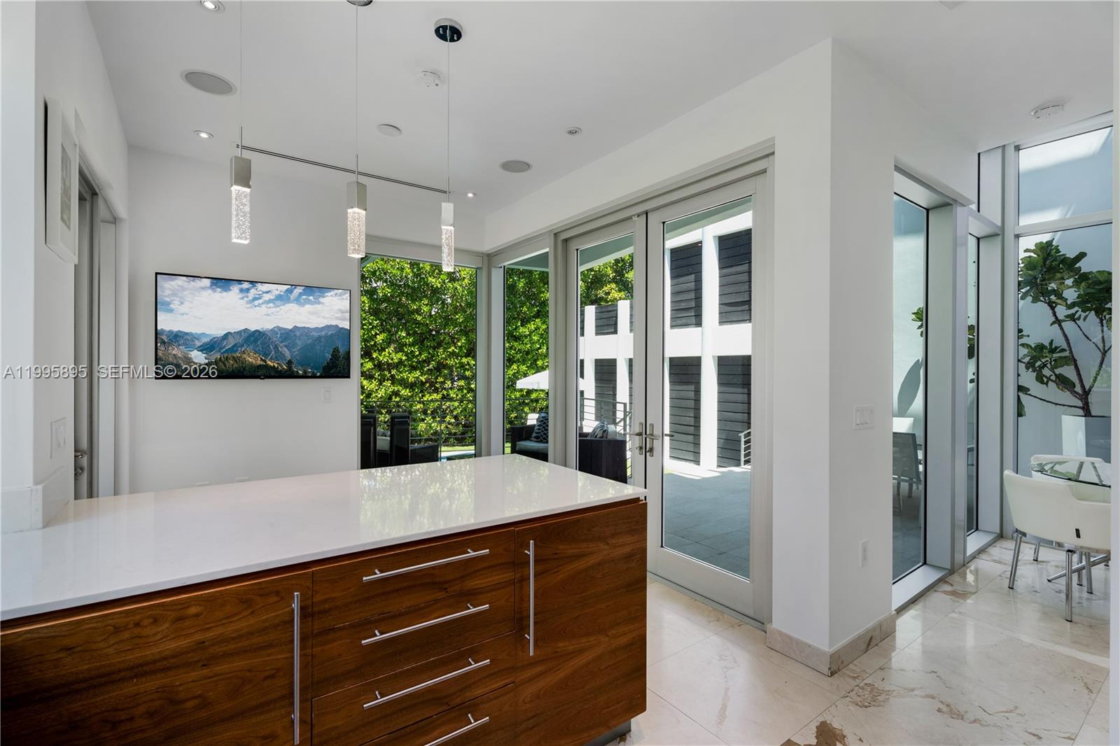 548 Fernwood Road, Unit 548 Key Biscayne, FL 33149 - Photo 3 of 50 a room with window and furniture