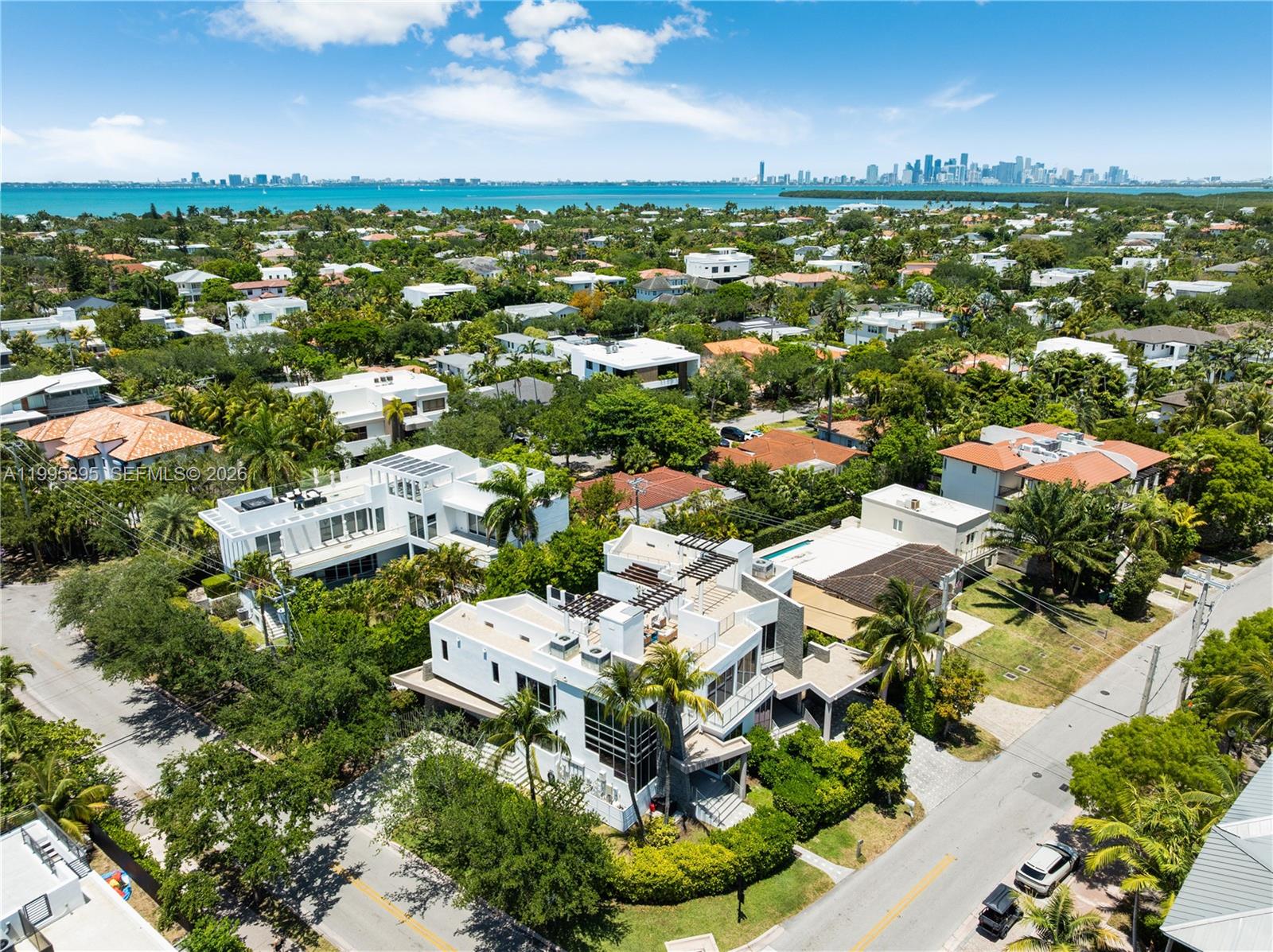 548 Fernwood Road, Unit 548 Key Biscayne, FL 33149 - Photo 47 of 50 an aerial view of residential houses with outdoor space and trees