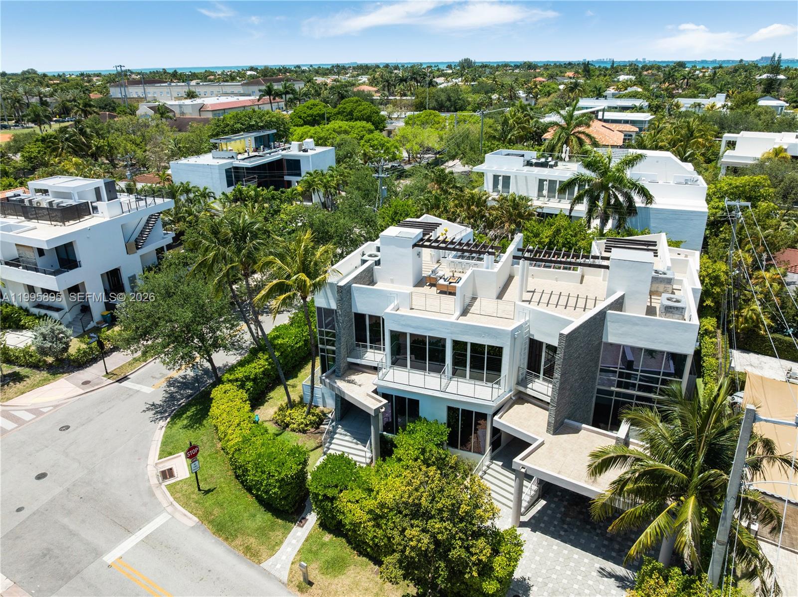 548 Fernwood Road, Unit 548 Key Biscayne, FL 33149 - Photo 49 of 50 an aerial view of residential houses with outdoor space