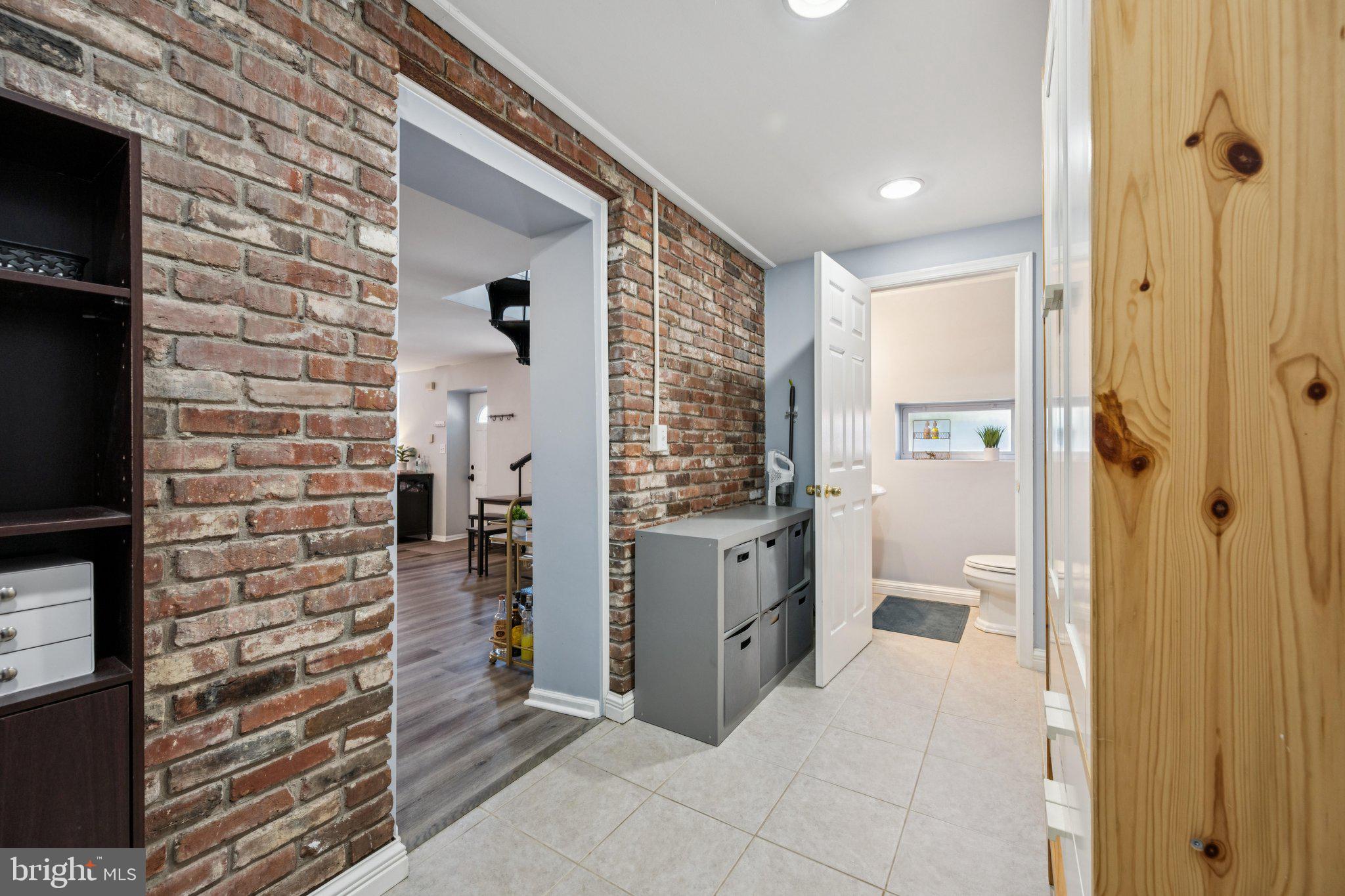 2731 Hudson Street Baltimore, MD 21224 - Photo 15 of 35 a bathroom with a shower and a sink