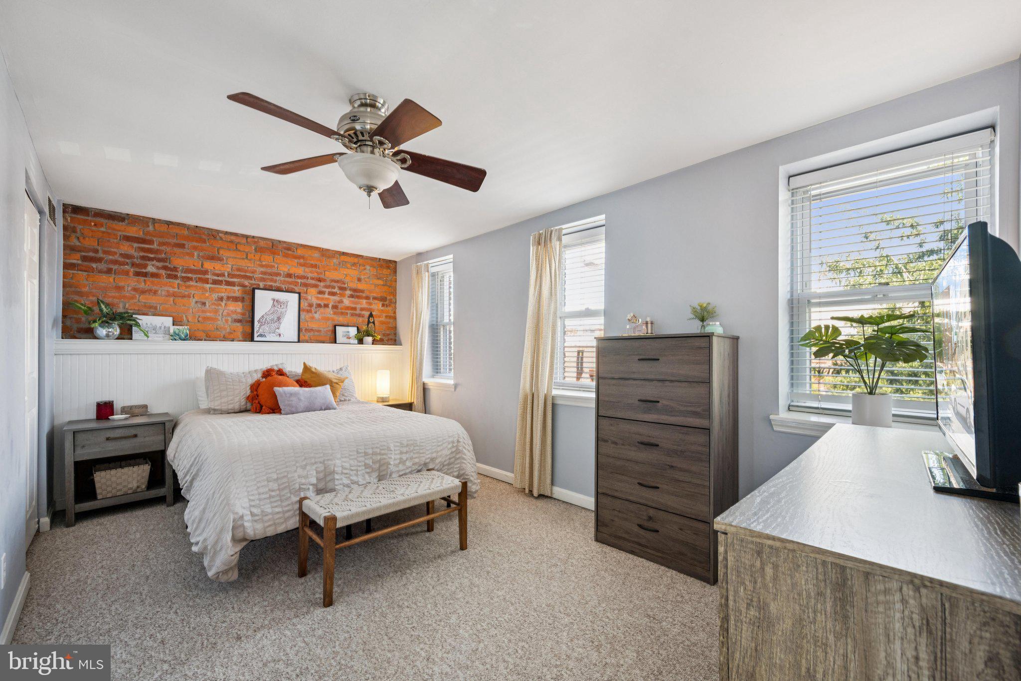 2731 Hudson Street Baltimore, MD 21224 - Photo 16 of 35 a bedroom with a bed and a window