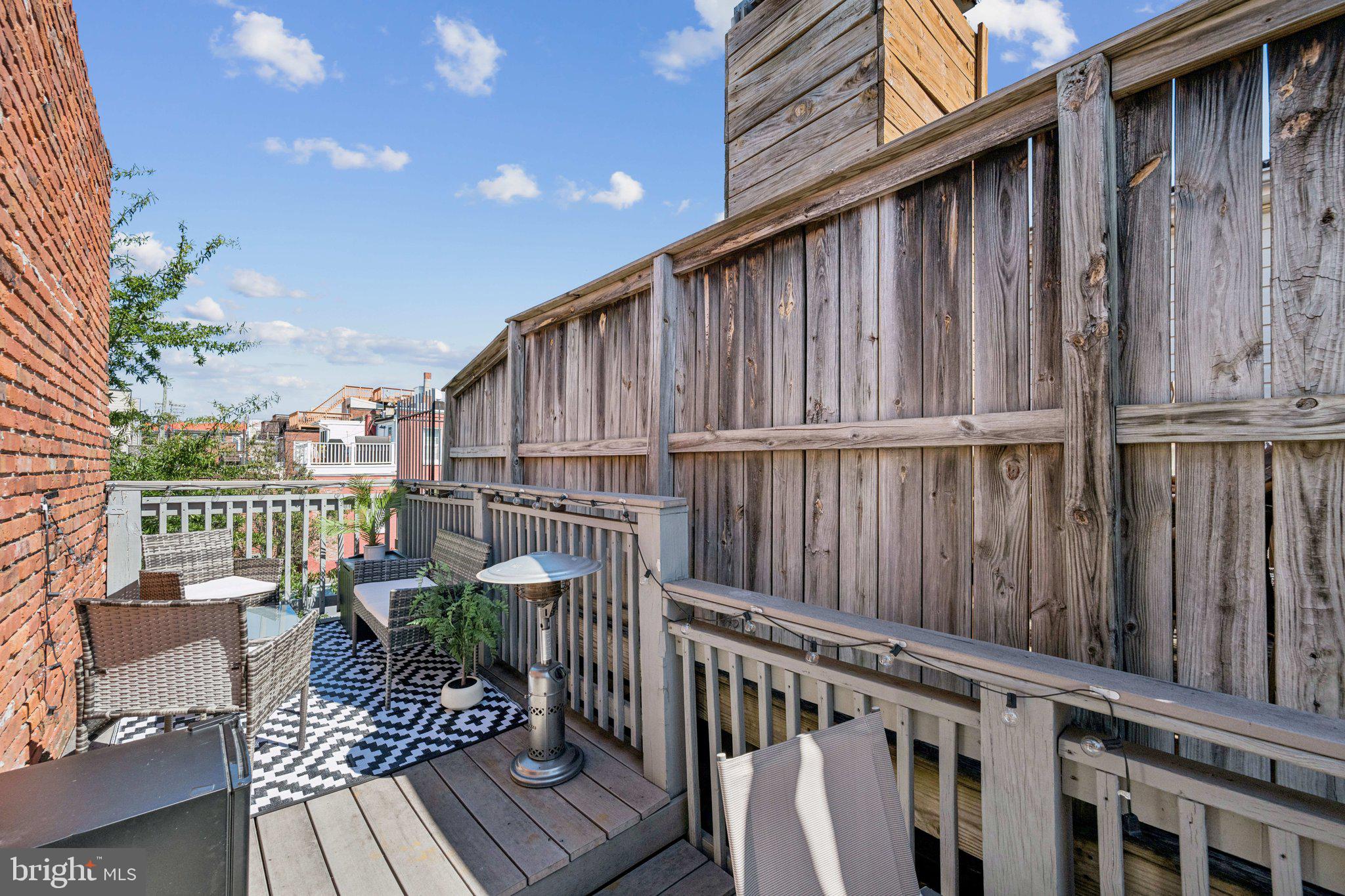 2731 Hudson Street Baltimore, MD 21224 - Photo 29 of 35 a view of balcony with furniture