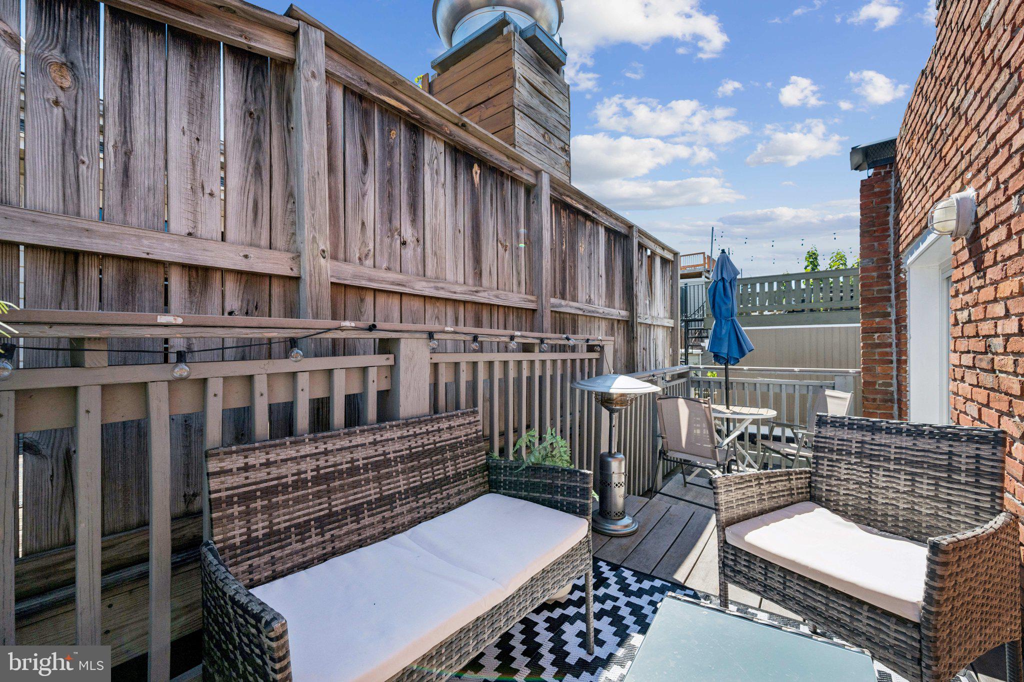 2731 Hudson Street Baltimore, MD 21224 - Photo 31 of 35 a view of a chairs on the roof deck