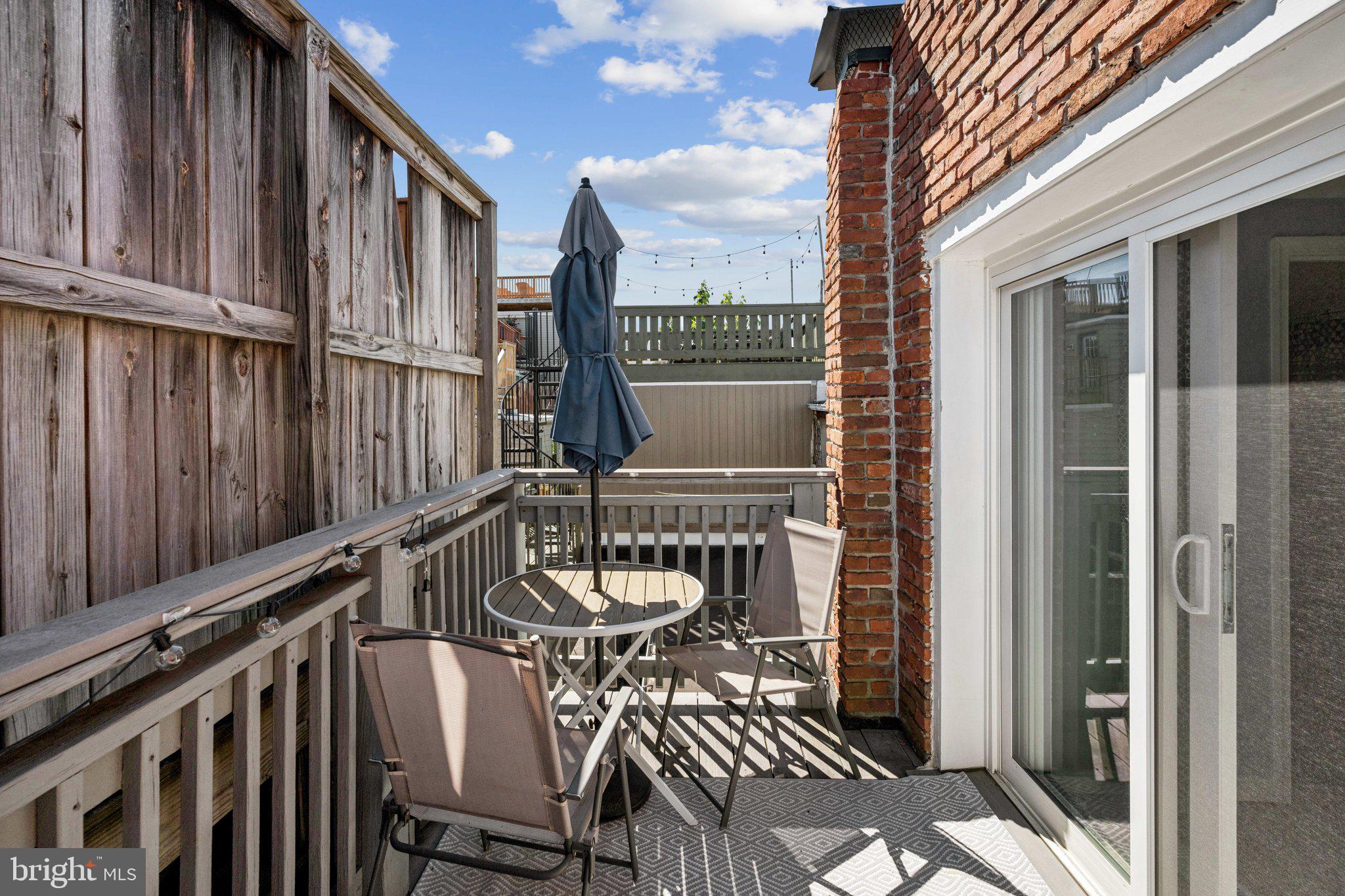 2731 Hudson Street Baltimore, MD 21224 - Photo 32 of 35 a view of balcony with furniture