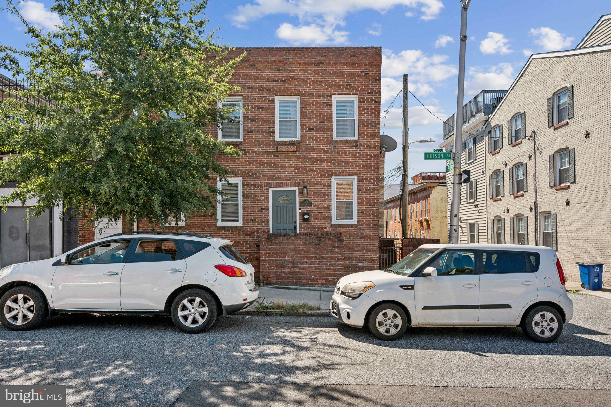 2731 Hudson Street Baltimore, MD 21224 - Photo 35 of 35 a car parked in front of a house