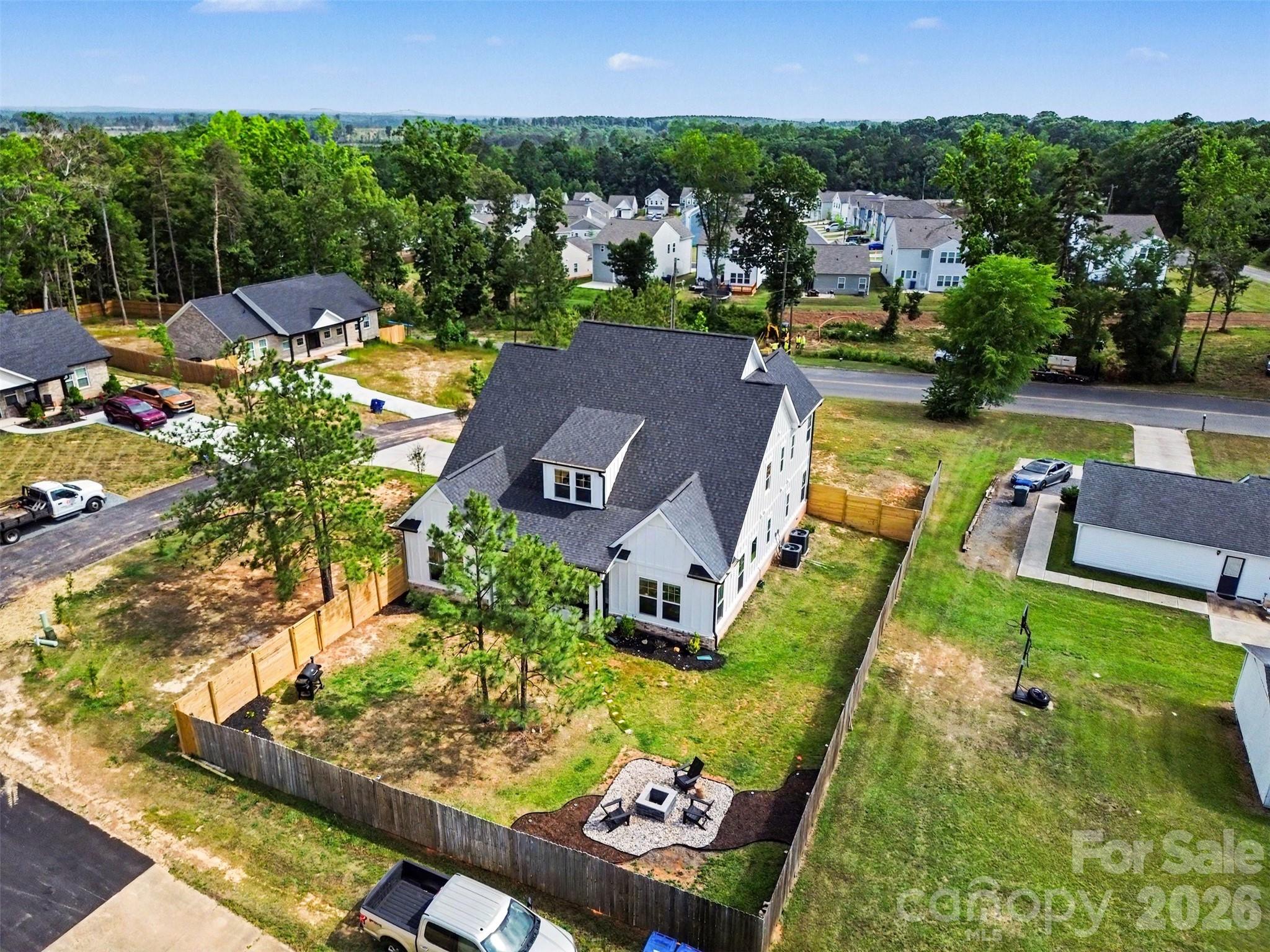 31 Ridgecrest Avenue Peachland, NC 28133 - Photo 7 of 30 an aerial view of a house with a garden and lake view