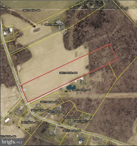 a view of a city with an outdoor space and seating area