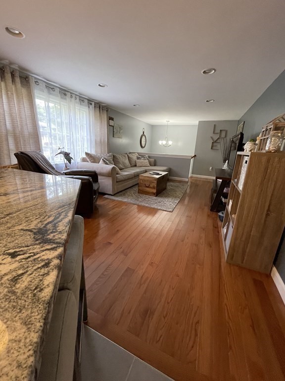 547 Delano Road Marion, MA 02738 - Photo 12 of 28 a living room with furniture and a wooden floor