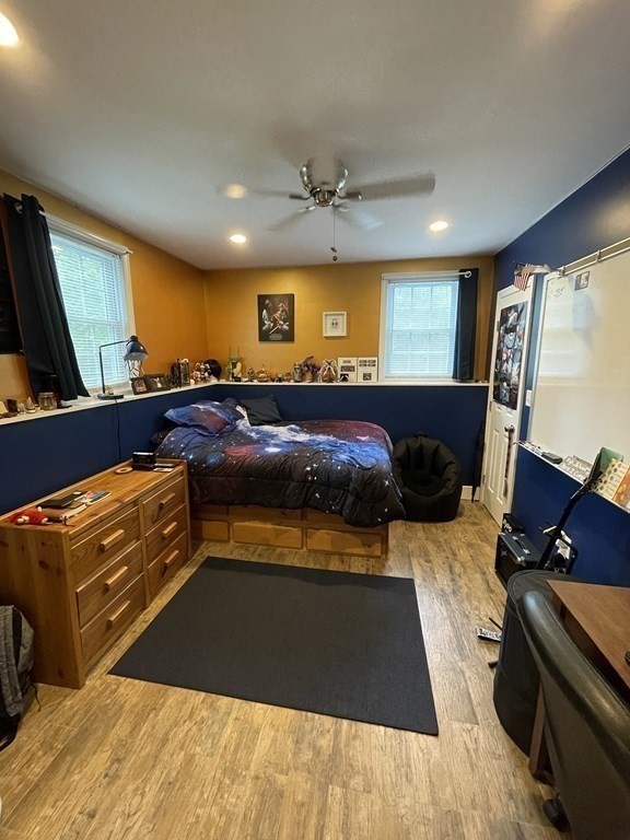 547 Delano Road Marion, MA 02738 - Photo 24 of 28 a bed room with a bed and a television