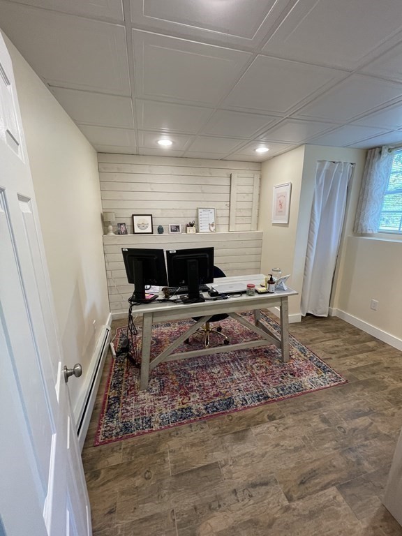 547 Delano Road Marion, MA 02738 - Photo 25 of 28 a living room with a couch and a rug