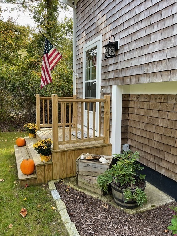 547 Delano Road Marion, MA 02738 - Photo 3 of 28 a front view of a house with garden