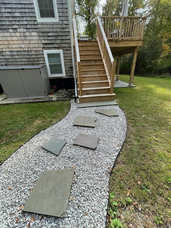 547 Delano Road Marion, MA 02738 - Photo 4 of 28 a view of a house with a yard