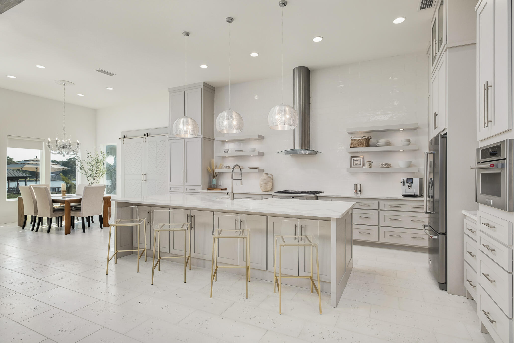 336 East Shipwreck Road Santa Rosa Beach, FL 32459 - Photo 11 of 50 a kitchen with kitchen island cabinets and a counter top space