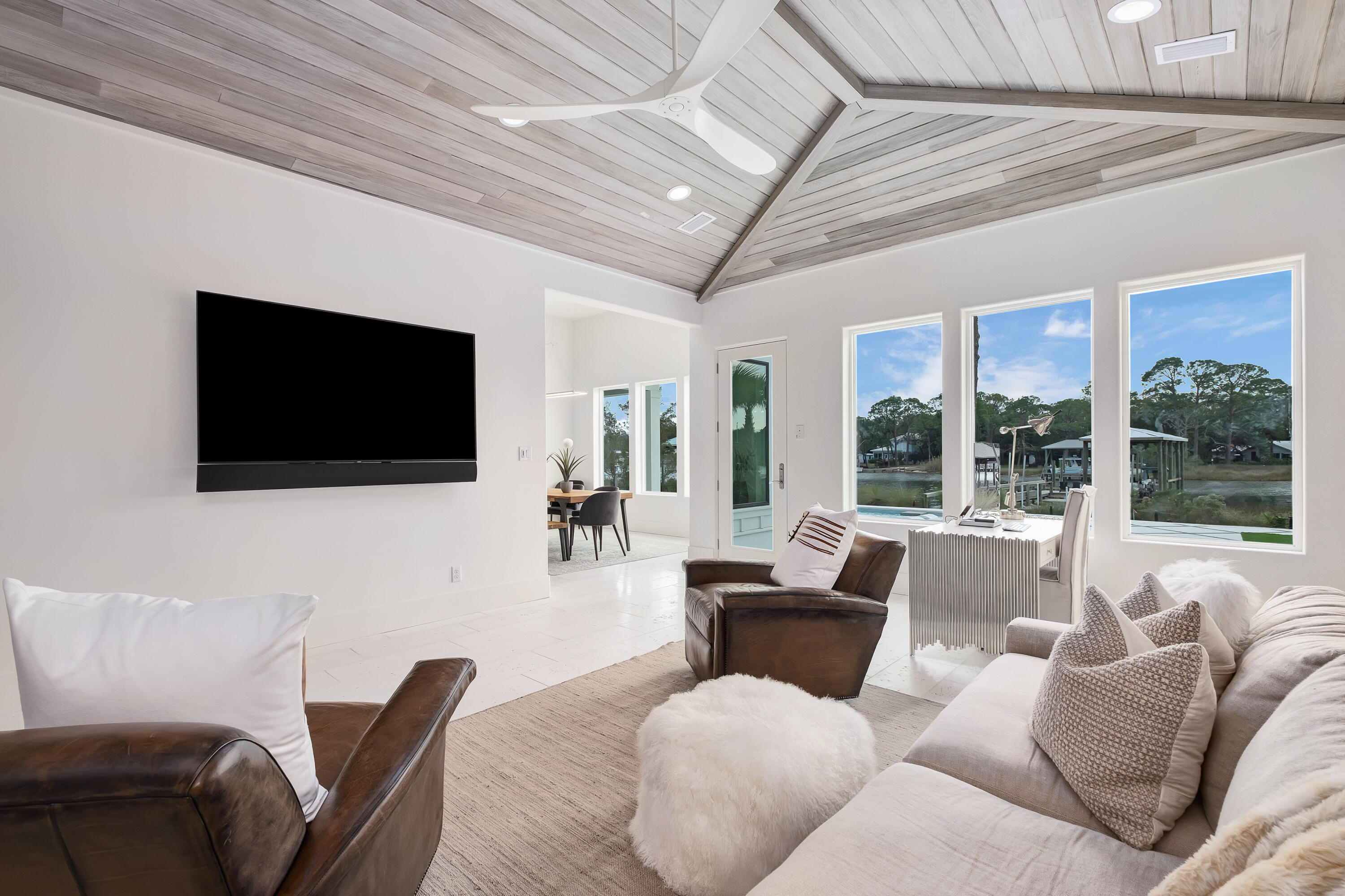 336 East Shipwreck Road Santa Rosa Beach, FL 32459 - Photo 16 of 50 a living room with furniture and a flat screen tv