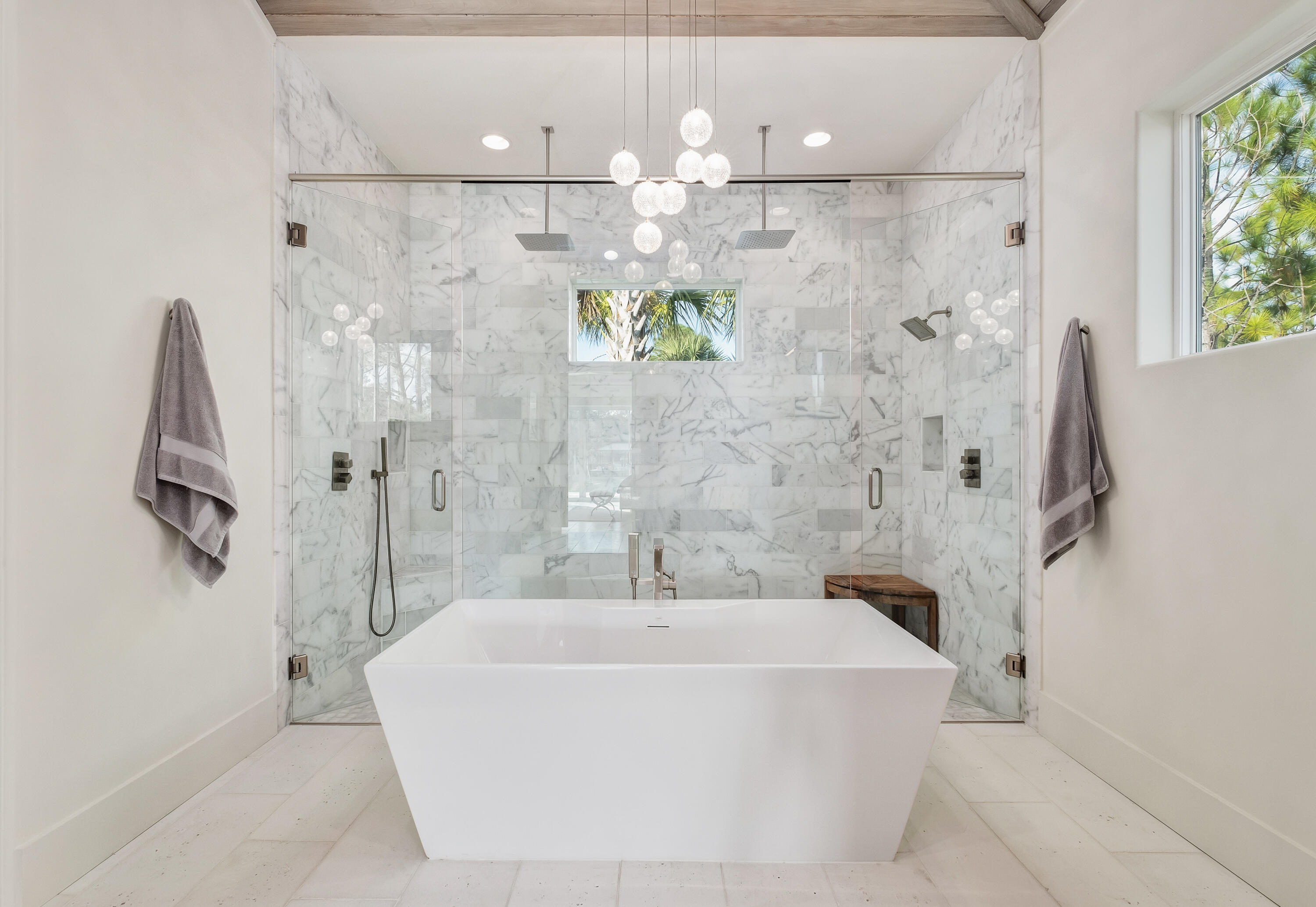 336 East Shipwreck Road Santa Rosa Beach, FL 32459 - Photo 21 of 50 a bathroom with a bathtub a shower and a sink