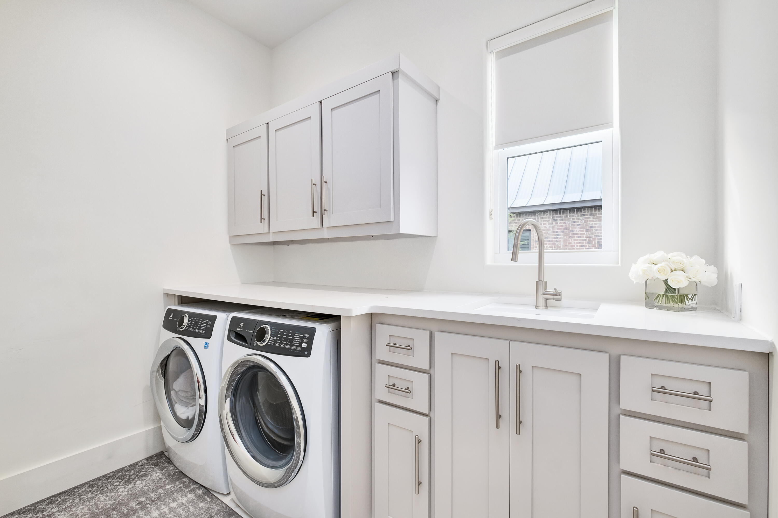 336 East Shipwreck Road Santa Rosa Beach, FL 32459 - Photo 27 of 50 a utility room with sink dryer and washer