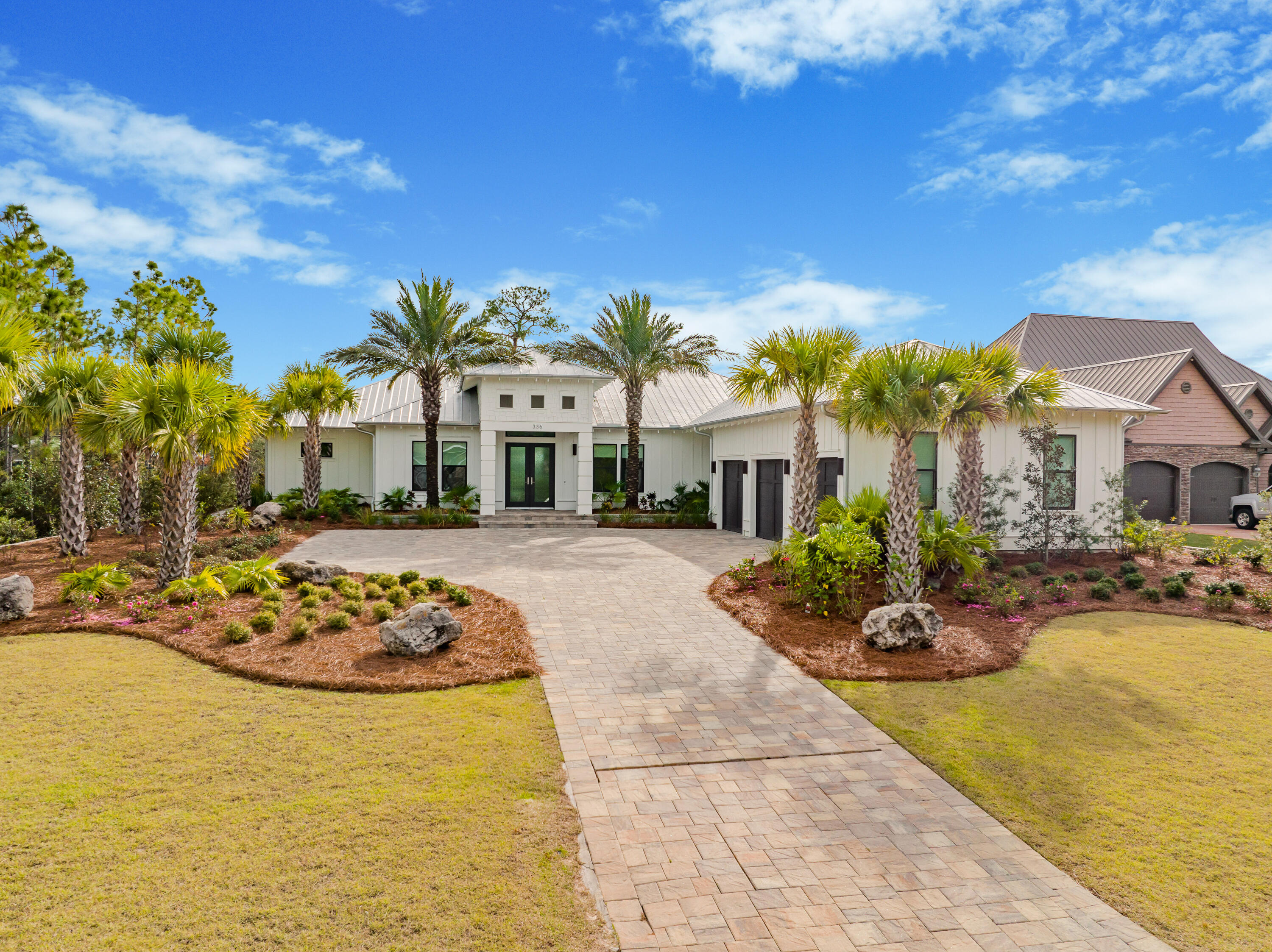 336 East Shipwreck Road Santa Rosa Beach, FL 32459 - Photo 30 of 50 a front view of a house with swimming pool