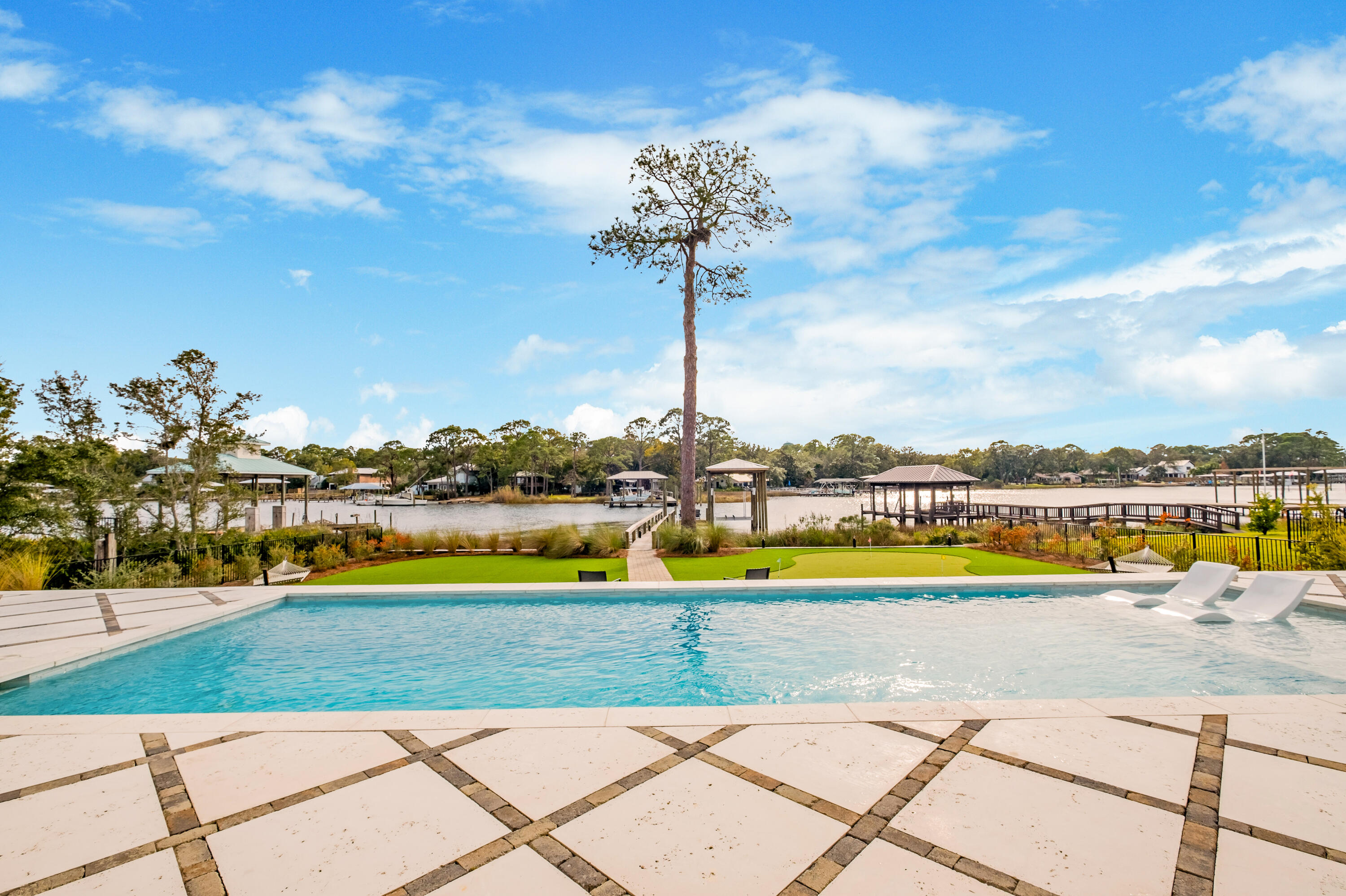 336 East Shipwreck Road Santa Rosa Beach, FL 32459 - Photo 36 of 50 a view of swimming pool with outdoor seating and yard in back
