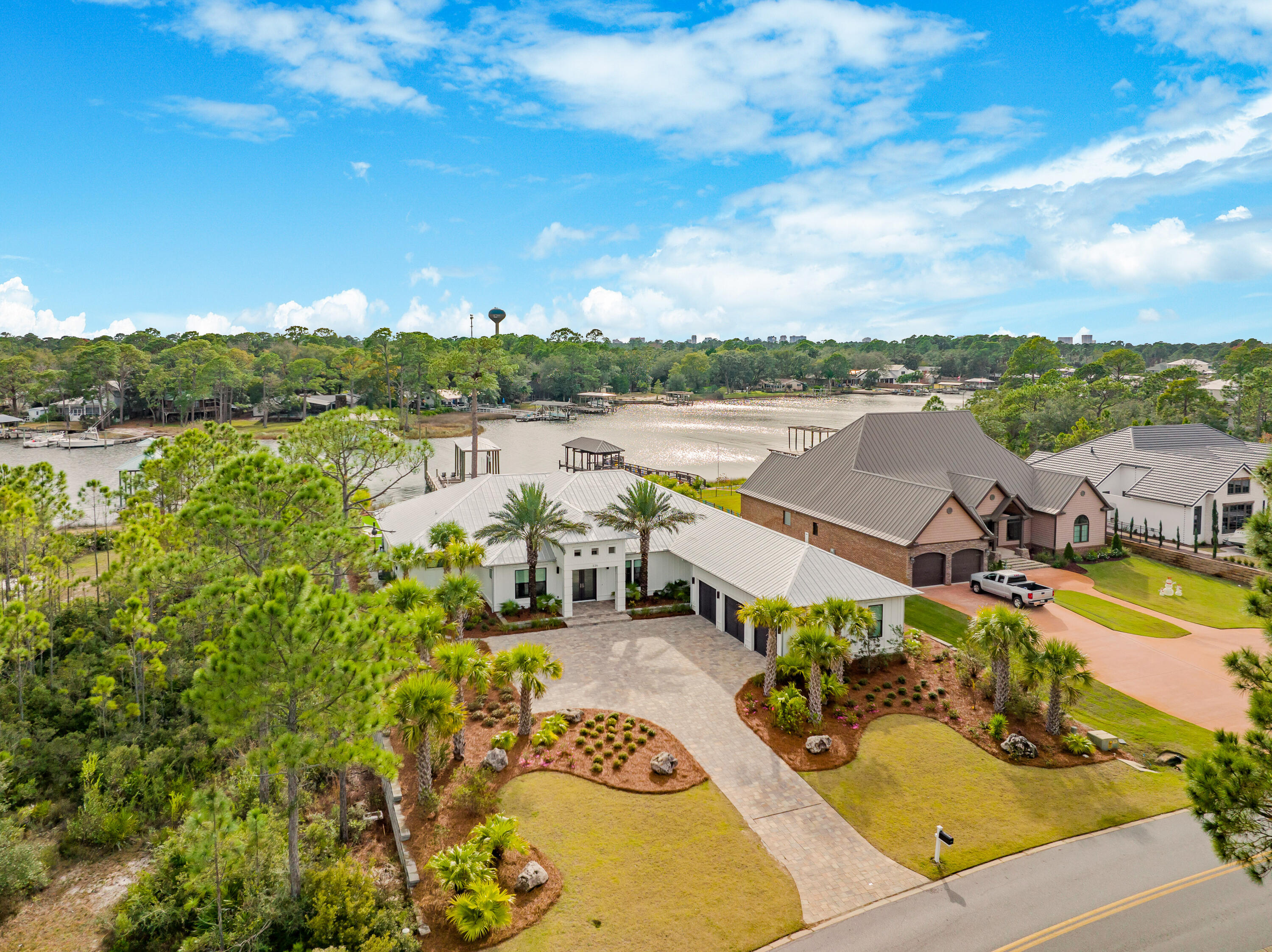 336 East Shipwreck Road Santa Rosa Beach, FL 32459 - Photo 45 of 50 a view of a lake with couches in the patio