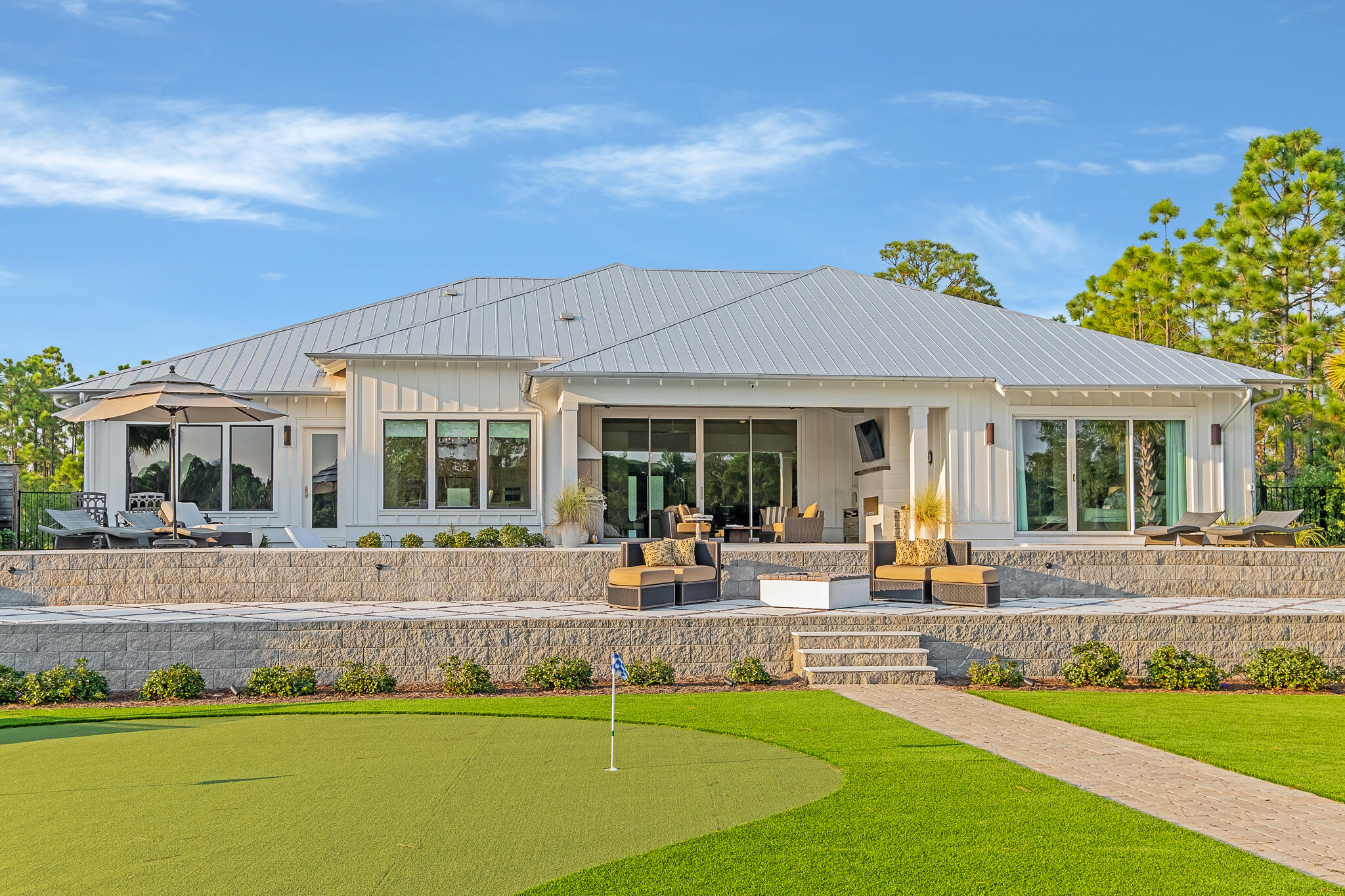 336 East Shipwreck Road Santa Rosa Beach, FL 32459 - Photo 47 of 50 a view of a house with swimming pool and sitting area